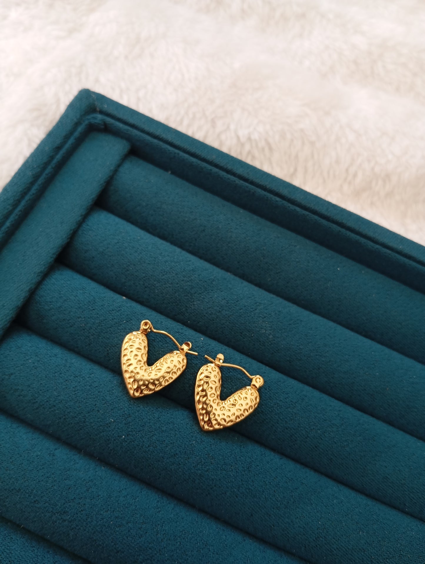 Golden Heart Hoop Earrings crafted from premium stainless steel with an elegant heart-shaped hoop design and long-lasting gold finish. Waterproof, tarnish-free earrings for women, perfect for daily wear, office wear, parties, weddings, gifting, and special occasions.