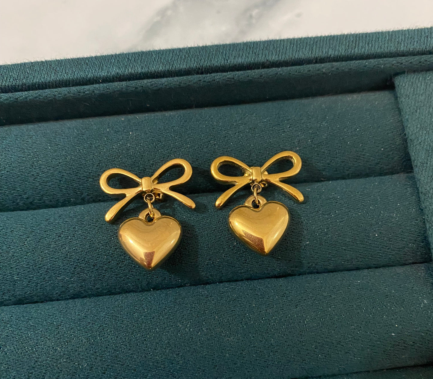 Heart Bow Earrings crafted from premium stainless steel featuring a heart and bow design. Waterproof, tarnish-free earrings for women, perfect for daily wear, parties, weddings, gifting, and special occasions.