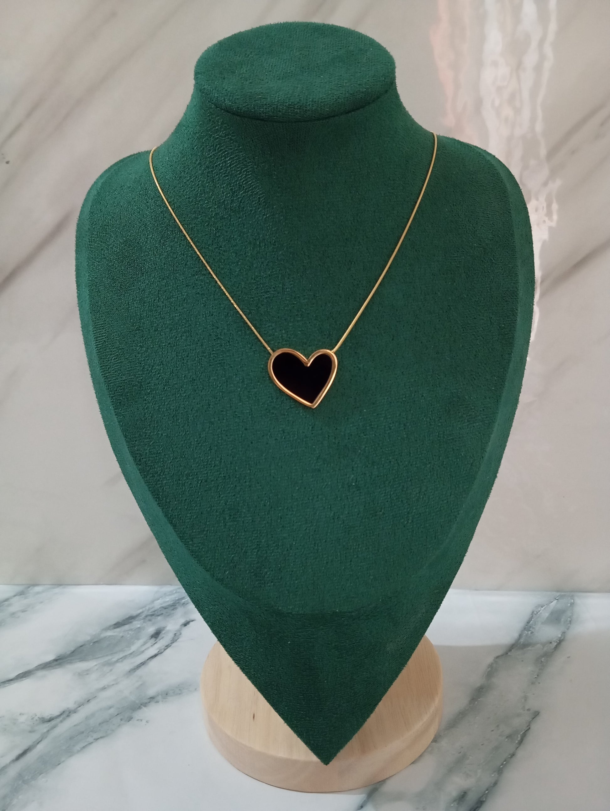 Gold Black Stone Heart Necklace featuring a heart-shaped pendant with an elegant black stone centerpiece. Crafted from premium stainless steel, this waterproof and tarnish-free necklace is ideal for daily wear, romantic gifting, anniversaries, parties, weddings, and special occasions.
