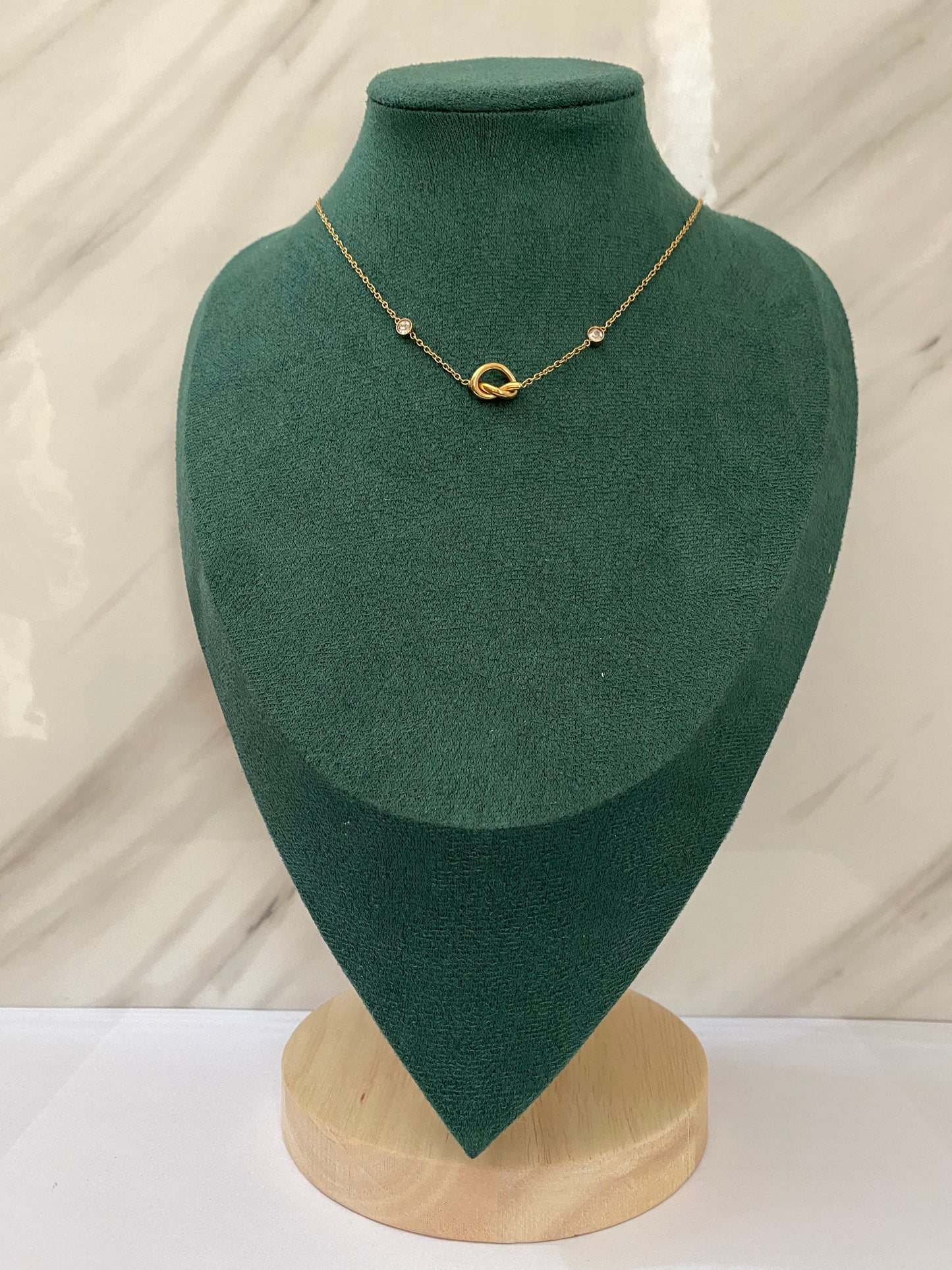 Gold Cute Knot Necklace featuring an elegant knot-shaped pendant crafted from premium stainless steel. Waterproof, tarnish-free jewelry for women, perfect for daily wear, office wear, parties, weddings, gifting, anniversaries, and stylish everyday fashion.
