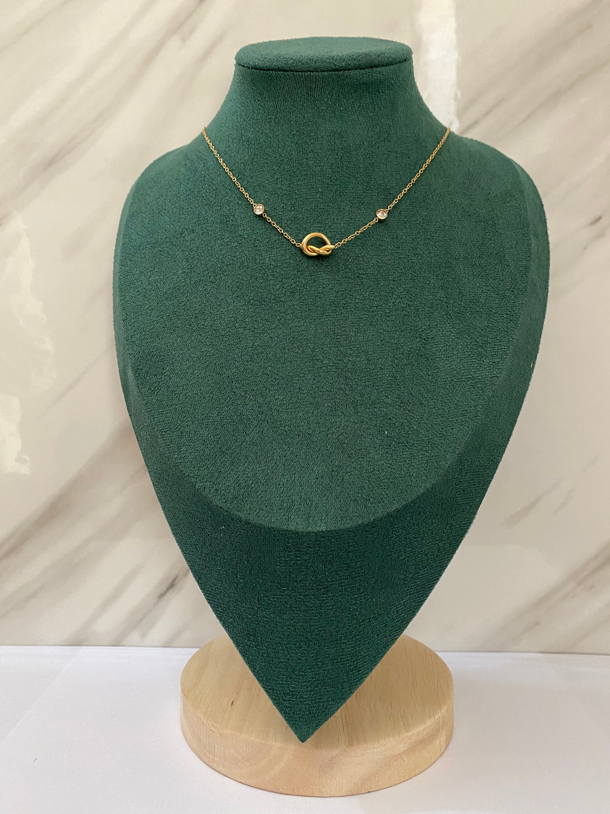 Gold Cute Knot Necklace featuring an elegant knot-shaped pendant crafted from premium stainless steel. Waterproof, tarnish-free jewelry for women, perfect for daily wear, office wear, parties, weddings, gifting, anniversaries, and stylish everyday fashion.
