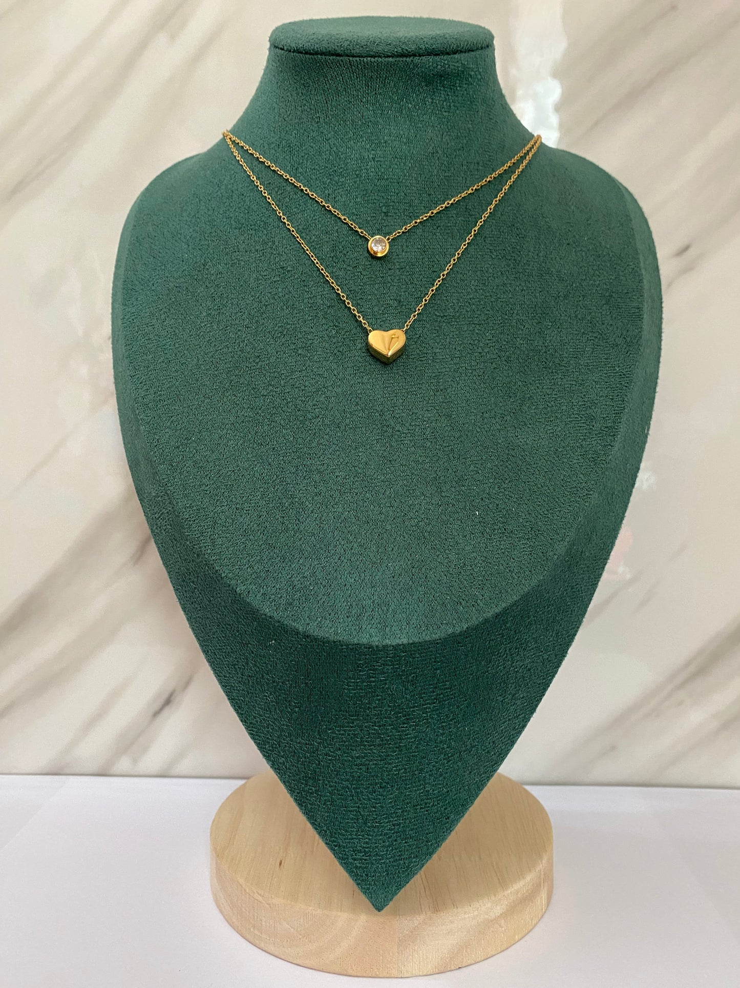 Gold Double Layer Diamond Heart Necklace featuring layered chains with a sparkling heart-shaped crystal pendant. Crafted from premium stainless steel, this waterproof and tarnish-free necklace is perfect for women’s daily wear, weddings, parties, gifting, anniversaries, and elegant styling.
