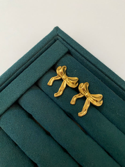 Golden Bow Earrings crafted from premium stainless steel with an elegant bow design, waterproof, tarnish free, lightweight earrings for women with long-lasting shine and durability.