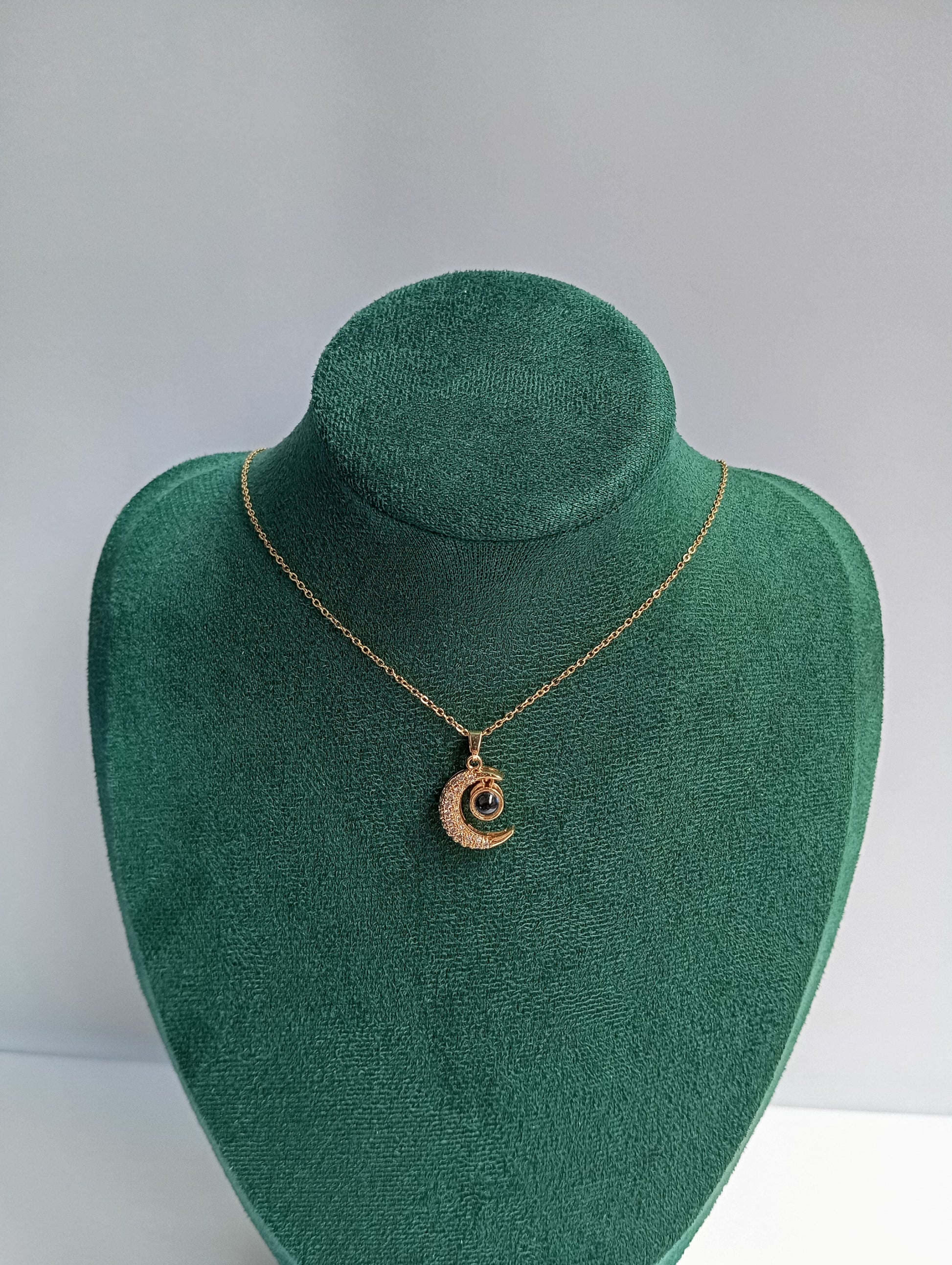 Gold Moon Necklace featuring an elegant crescent moon pendant crafted from premium stainless steel with a luxurious golden finish. Waterproof, tarnish-free jewelry for women, perfect for daily wear, celestial styling, gifting, parties, weddings, and special occasions.
