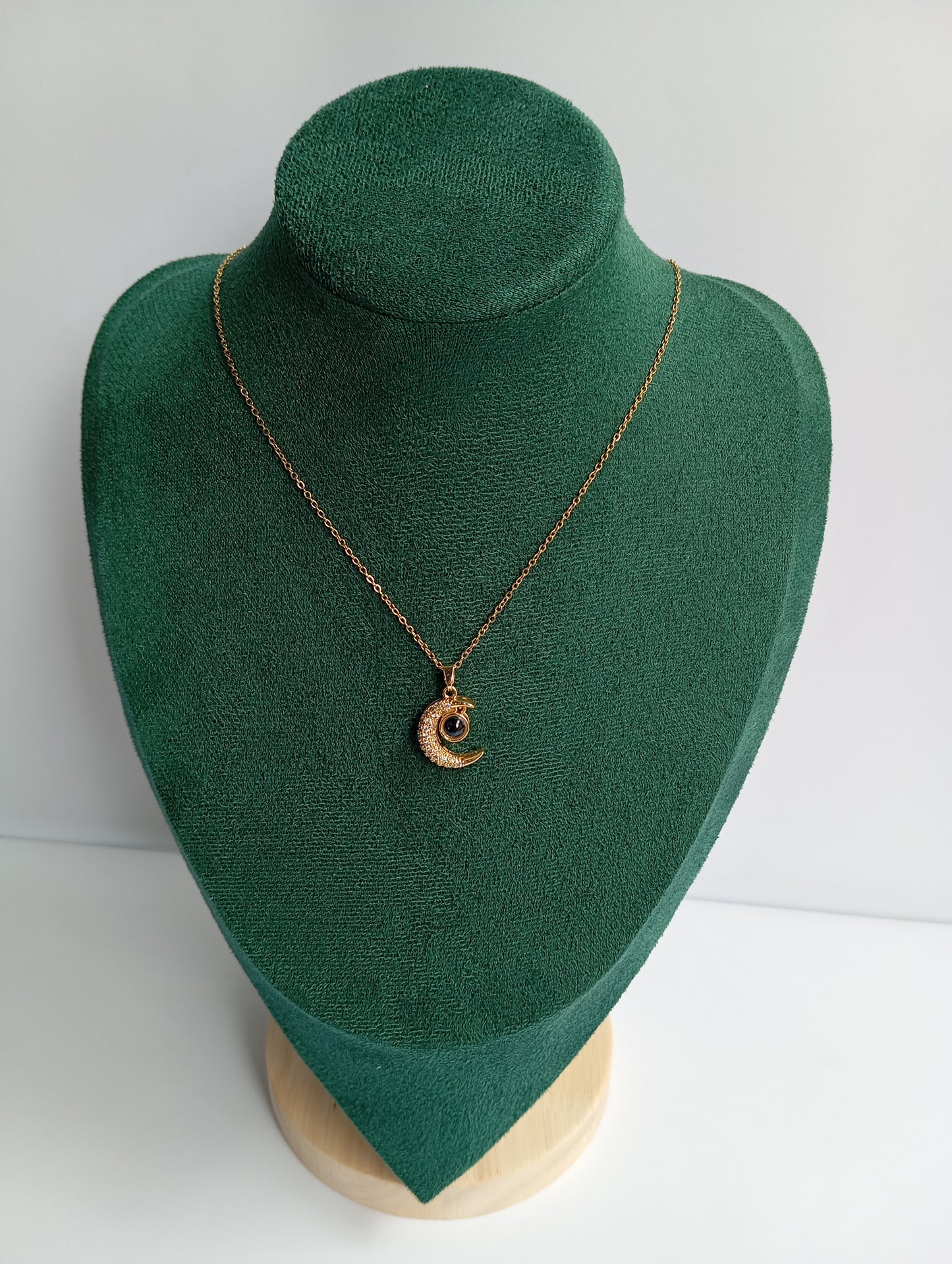 Gold Moon Necklace featuring an elegant crescent moon pendant crafted from premium stainless steel with a luxurious golden finish. Waterproof, tarnish-free jewelry for women, perfect for daily wear, celestial styling, gifting, parties, weddings, and special occasions.
