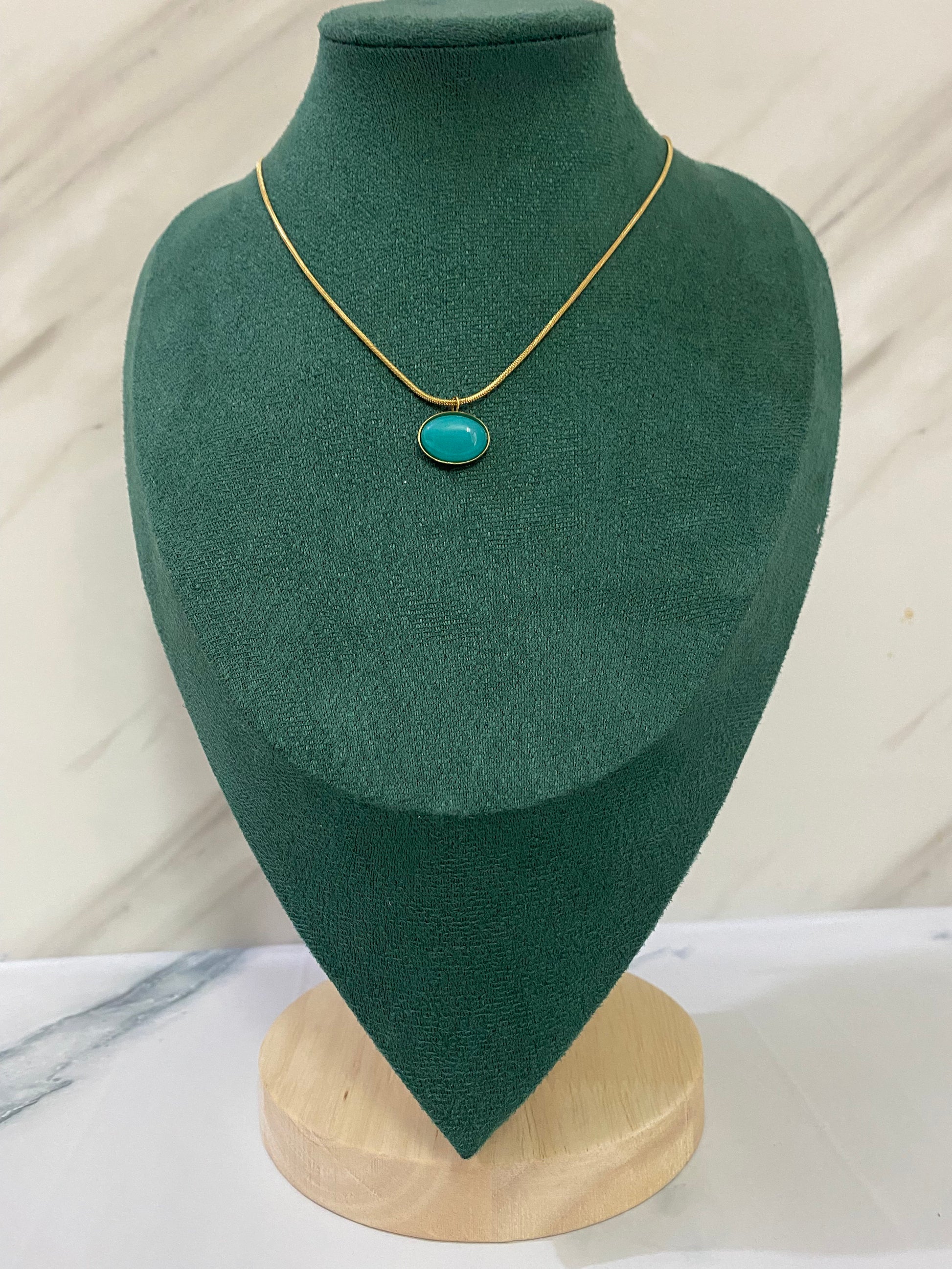 Gold Oval Gemstone Necklace featuring a beautiful oval-cut gemstone pendant crafted from premium stainless steel. Waterproof, tarnish-free necklace for women, ideal for daily wear, office wear, weddings, parties, gifting, and special occasions.
