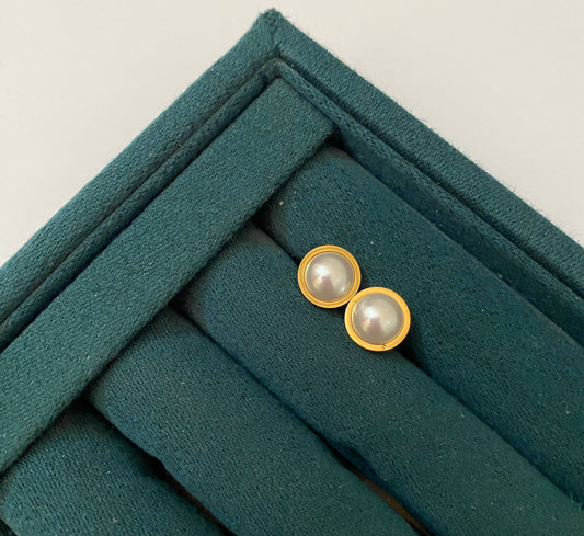 Elegant Pearl Earrings crafted from premium stainless steel with lustrous pearl accents. Lightweight, waterproof, tarnish-free earrings designed for everyday wear and backed by a 1 Year Colour Guarantee.