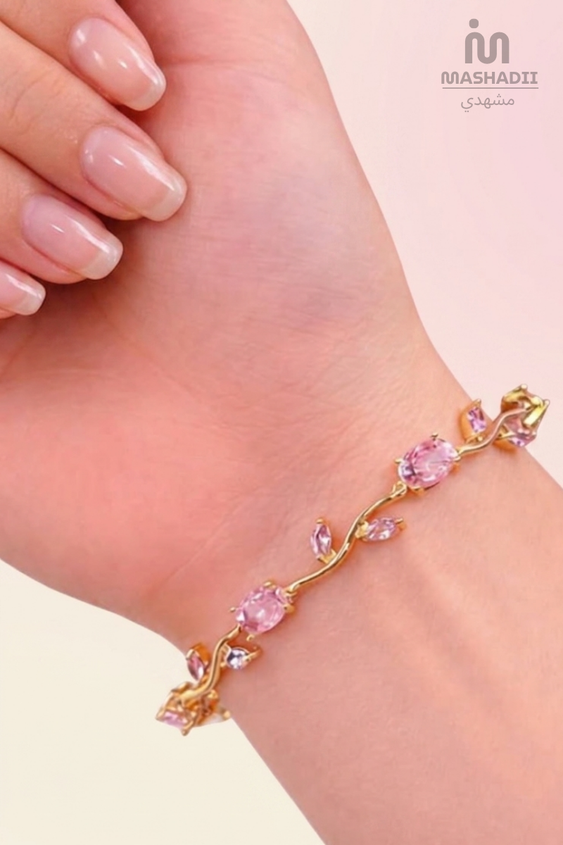 Pink Crystal Tulip Vine Bracelet crafted from premium stainless steel with sparkling pink crystal accents and elegant floral vine detailing. Waterproof, tarnish-free bracelet with 1 Year Colour Guarantee.