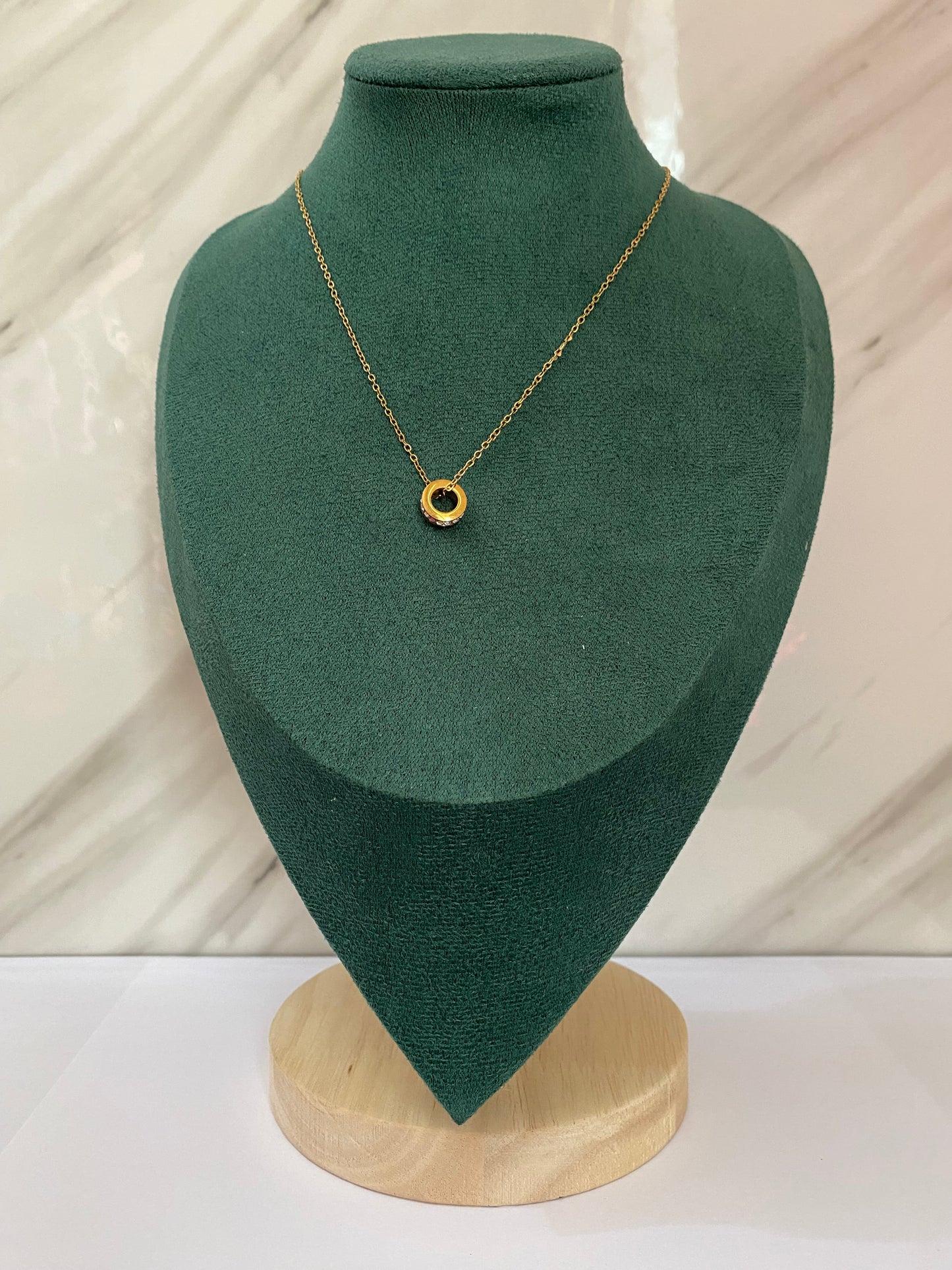 Gold Ring Sleek Chain Necklace featuring a polished circular ring pendant on a sleek stainless steel chain. Waterproof, tarnish-free jewelry for women, perfect for daily wear, office wear, parties, weddings, gifting, and minimalist fashion styling.
