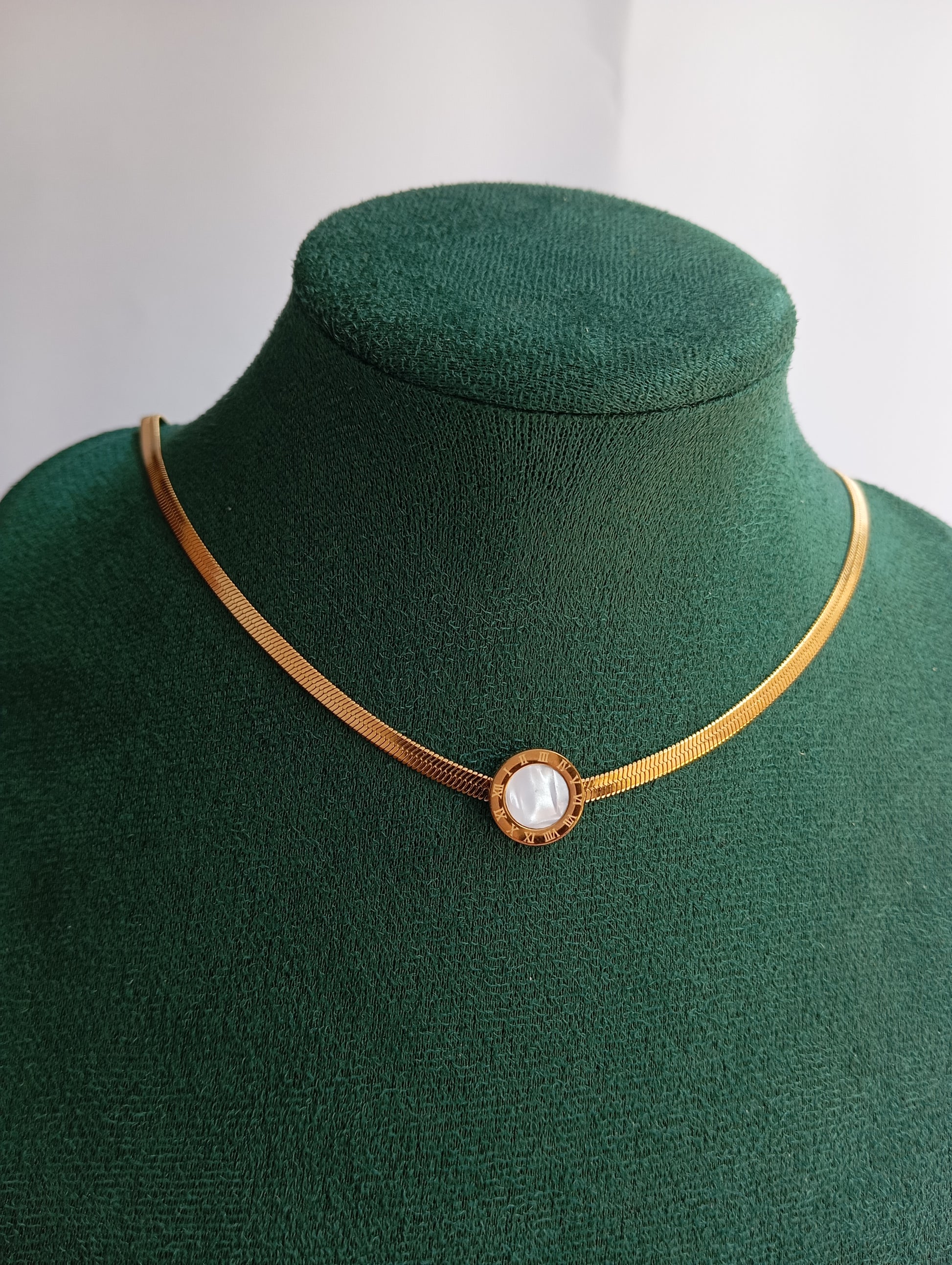 Gold Roman White Stone Broad Chain Necklace featuring a bold chain design with Roman-inspired details and sparkling white stone accents. Crafted from premium stainless steel, this waterproof and tarnish-free necklace is ideal for daily wear, parties, weddings, gifting, and statement styling.
