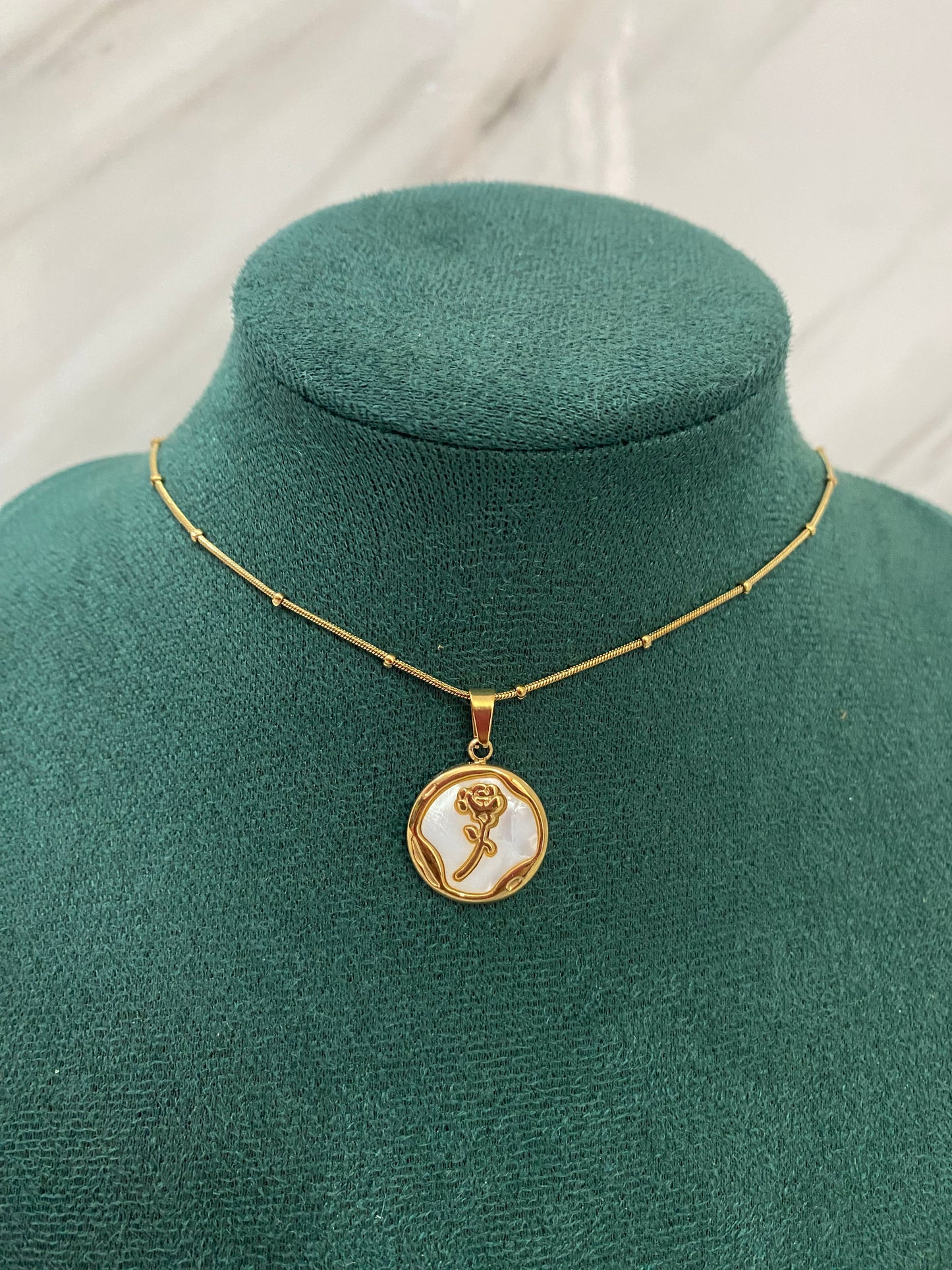 Gold Round Rose Necklace featuring a delicate rose motif inside a round pendant. Crafted from premium stainless steel, this waterproof and tarnish-free necklace is perfect for women’s everyday wear, parties, weddings, gifting, and elegant styling.
