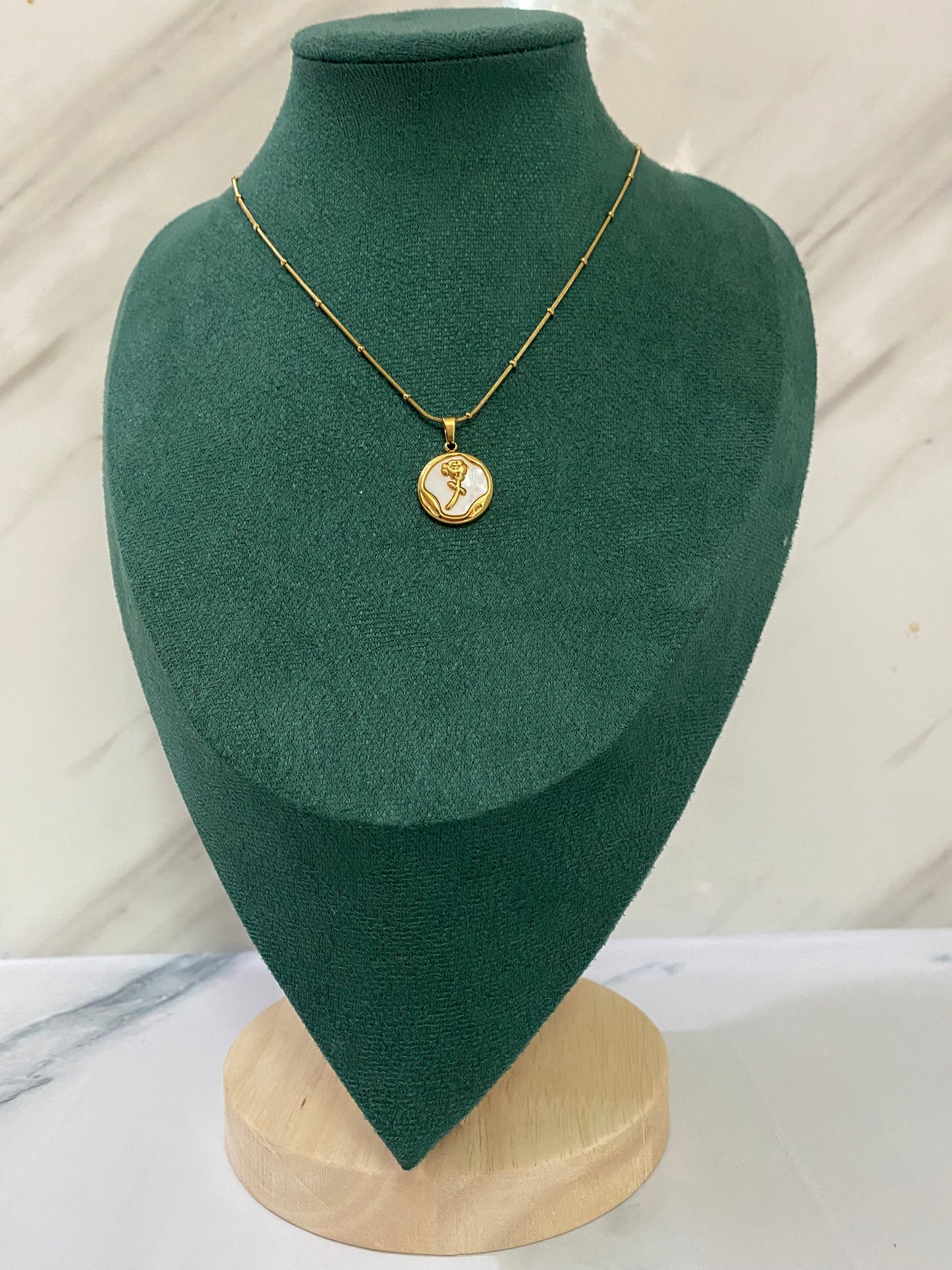 Gold Round Rose Necklace featuring a delicate rose motif inside a round pendant. Crafted from premium stainless steel, this waterproof and tarnish-free necklace is perfect for women’s everyday wear, parties, weddings, gifting, and elegant styling.
