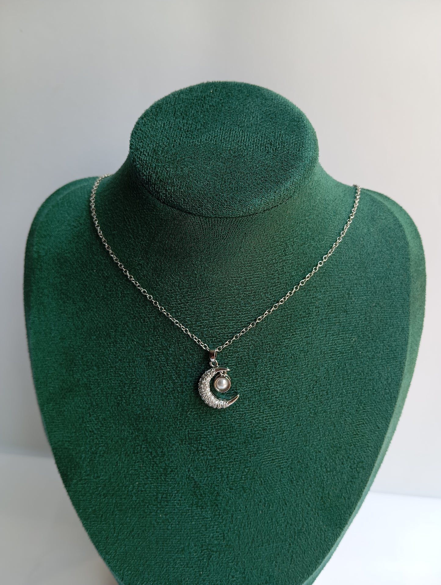Silver Moon Necklace featuring a delicate crescent moon pendant crafted from premium stainless steel. Waterproof, tarnish-free jewelry for women, perfect for everyday wear, celestial styling, parties, gifting, weddings, and special occasions.
