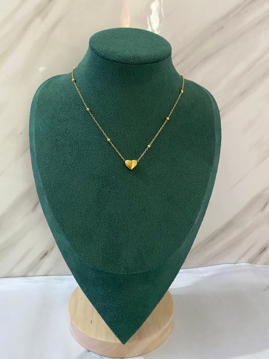 Gold Solid Heart Necklace featuring a polished heart-shaped pendant crafted from premium stainless steel. Waterproof, tarnish-free necklace for women, perfect for daily wear, romantic gifting, anniversaries, parties, weddings, and elegant fashion styling.
