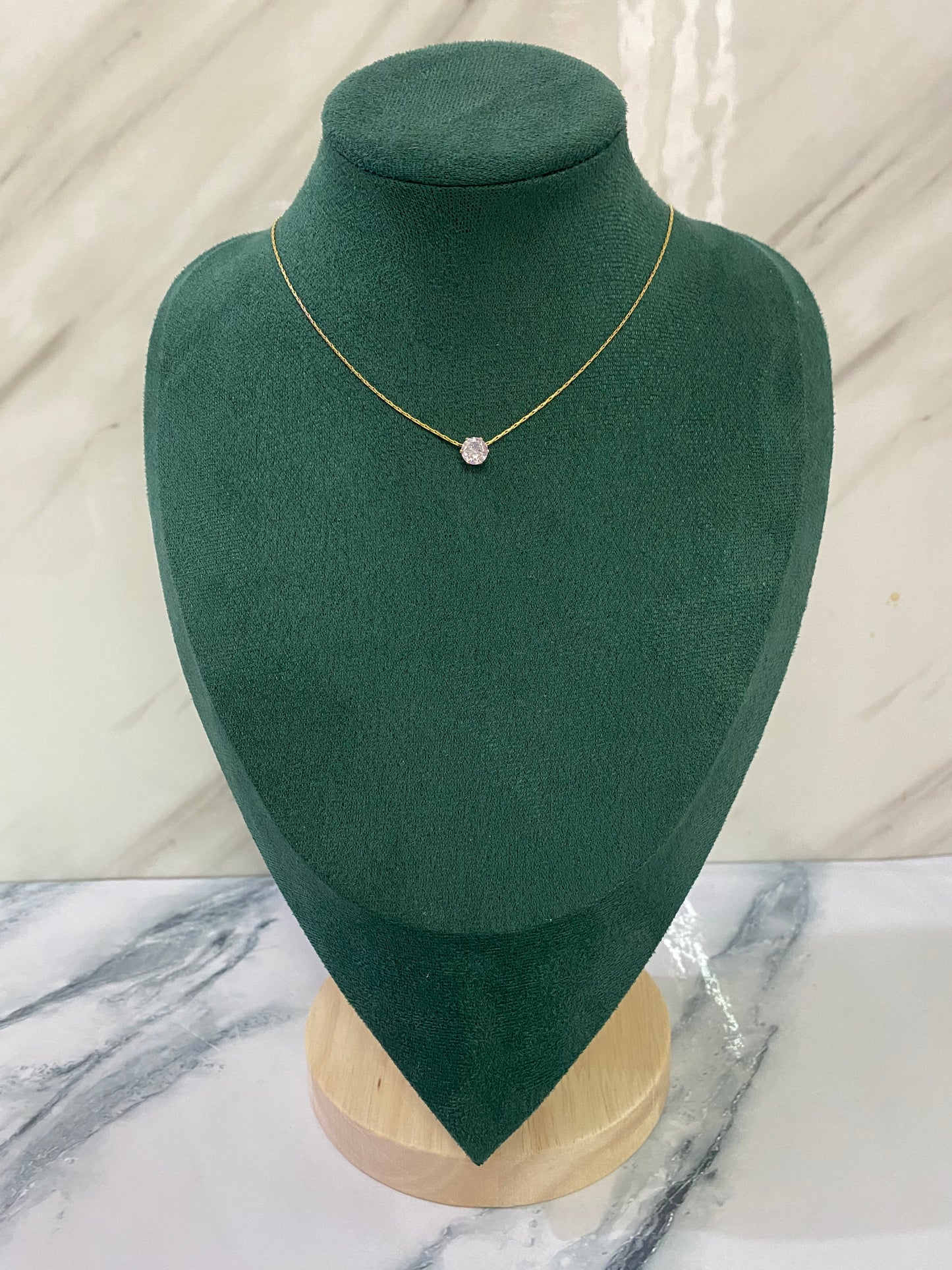 Gold Solitaire Necklace featuring a sparkling solitaire stone pendant crafted from premium stainless steel. Waterproof, tarnish-free jewelry for women, perfect for everyday wear, weddings, parties, gifting, anniversaries, and elegant fashion styling.

