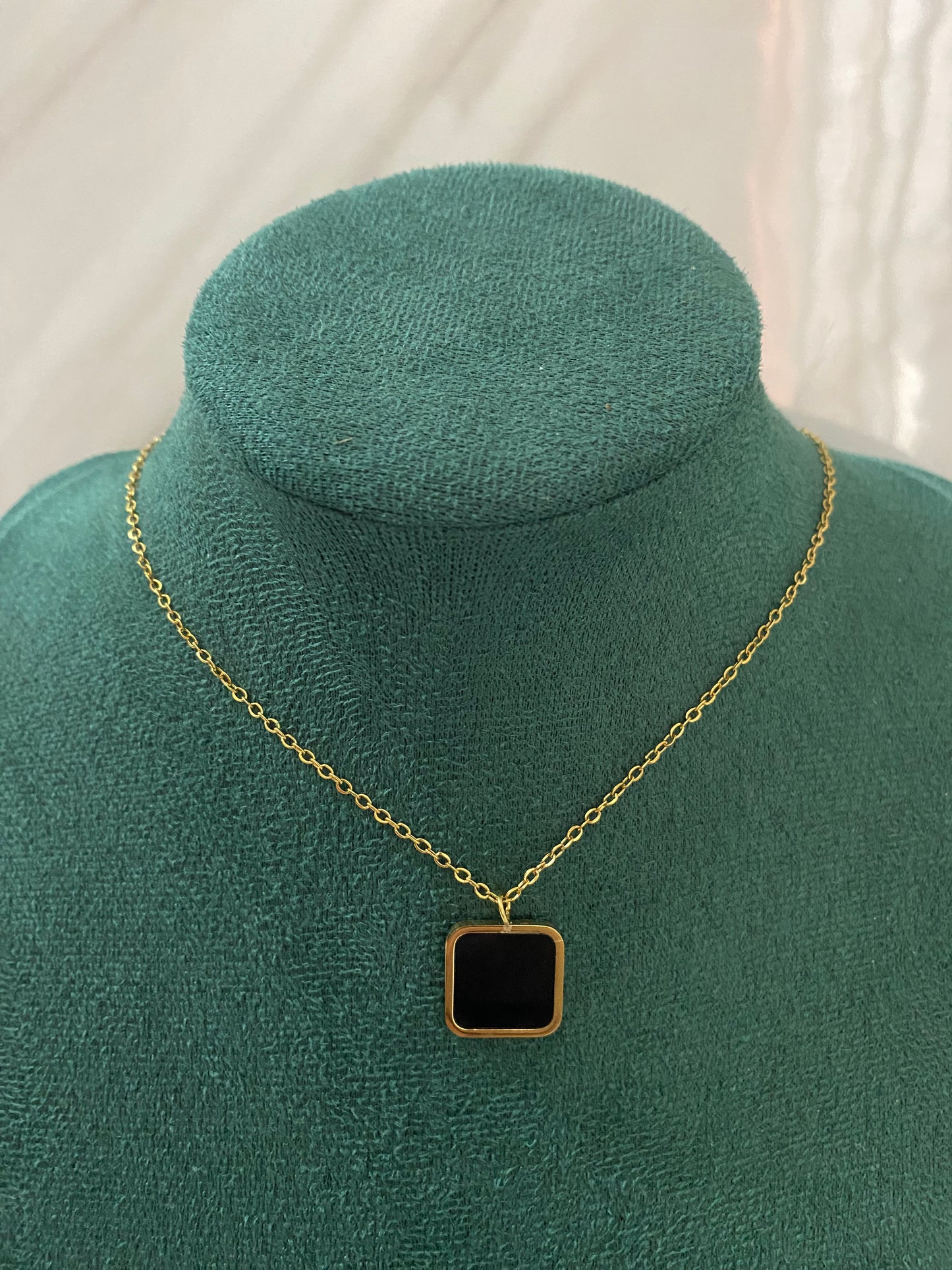 Gold Square Black Stone Necklace featuring an elegant square-cut black stone pendant crafted from premium stainless steel. Waterproof, tarnish-free jewelry for women, perfect for everyday wear, office styling, parties, weddings, gifting, and special occasions.
