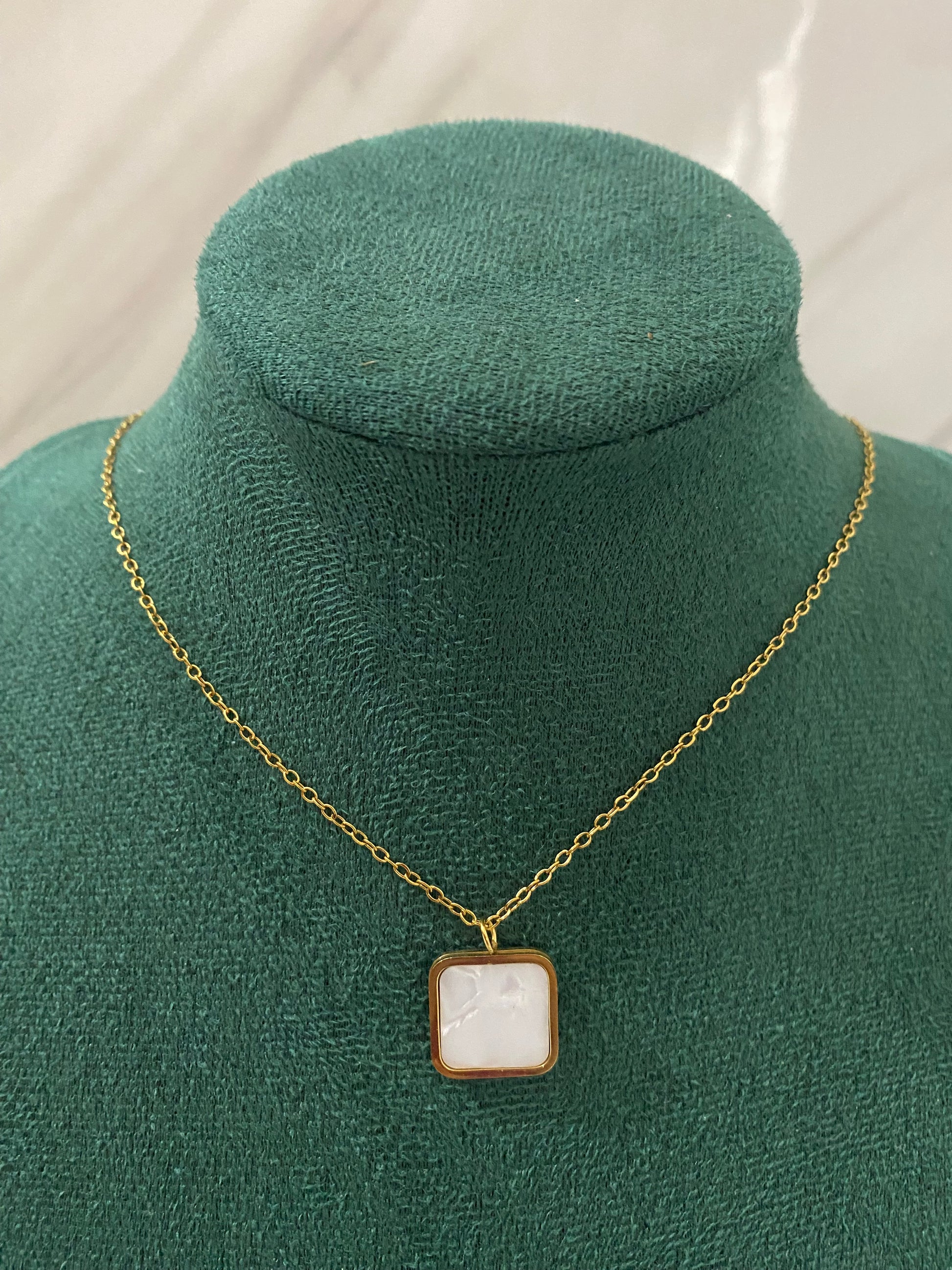 Gold Square White Stone Necklace featuring a brilliant square-cut white stone pendant crafted from premium stainless steel. Waterproof, tarnish-free jewelry for women, ideal for everyday wear, office wear, weddings, parties, gifting, and elegant styling.
