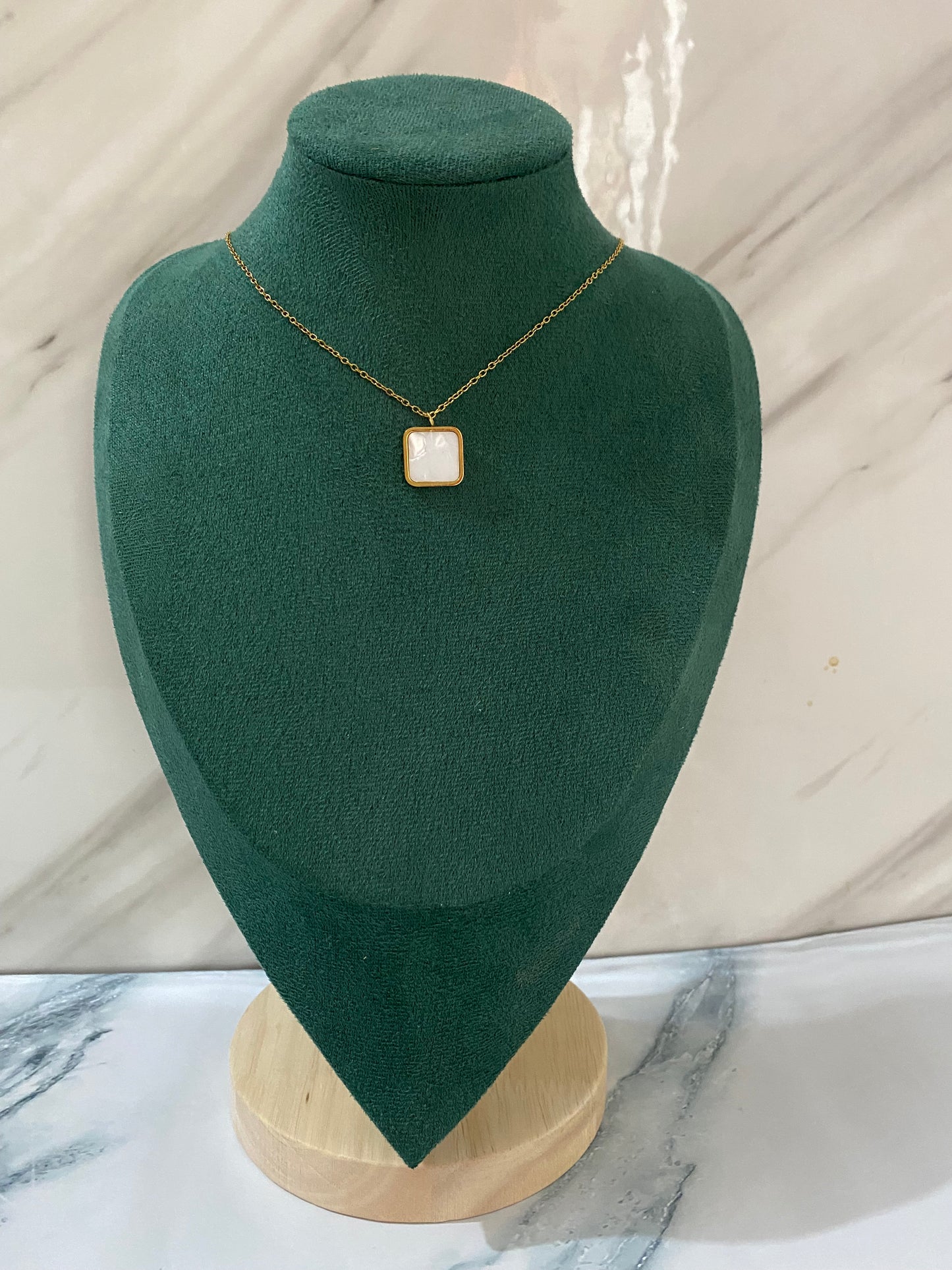 Gold Square White Stone Necklace featuring a brilliant square-cut white stone pendant crafted from premium stainless steel. Waterproof, tarnish-free jewelry for women, ideal for everyday wear, office wear, weddings, parties, gifting, and elegant styling.
