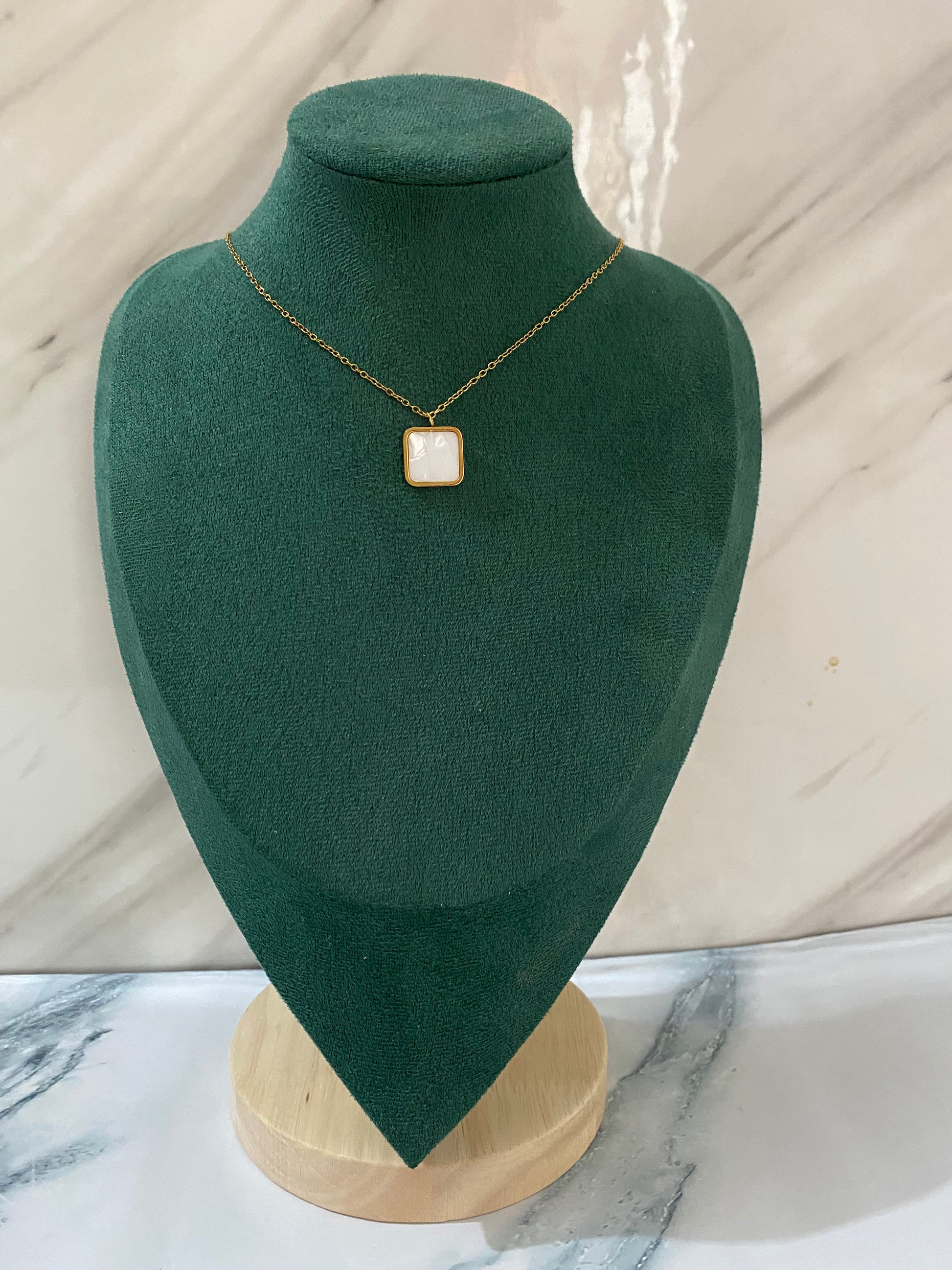 Gold Square White Stone Necklace featuring a brilliant square-cut white stone pendant crafted from premium stainless steel. Waterproof, tarnish-free jewelry for women, ideal for everyday wear, office wear, weddings, parties, gifting, and elegant styling.
