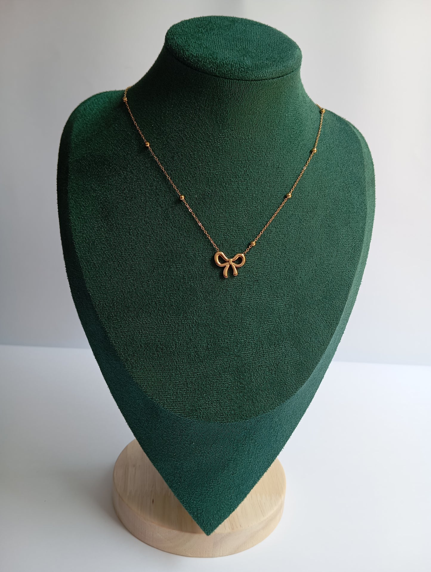 Stainless Steel Bow Necklace featuring a delicate bow-shaped pendant crafted from premium stainless steel. Waterproof, tarnish-free jewelry for women, perfect for daily wear, parties, weddings, gifting, office wear, and elegant fashion styling.
