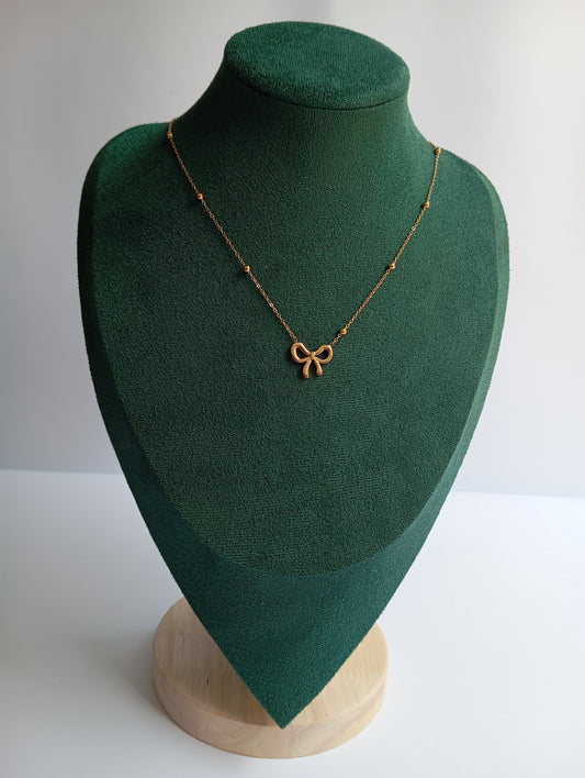 Stainless Steel Bow Necklace featuring a delicate bow-shaped pendant crafted from premium stainless steel. Waterproof, tarnish-free jewelry for women, perfect for daily wear, parties, weddings, gifting, office wear, and elegant fashion styling.
