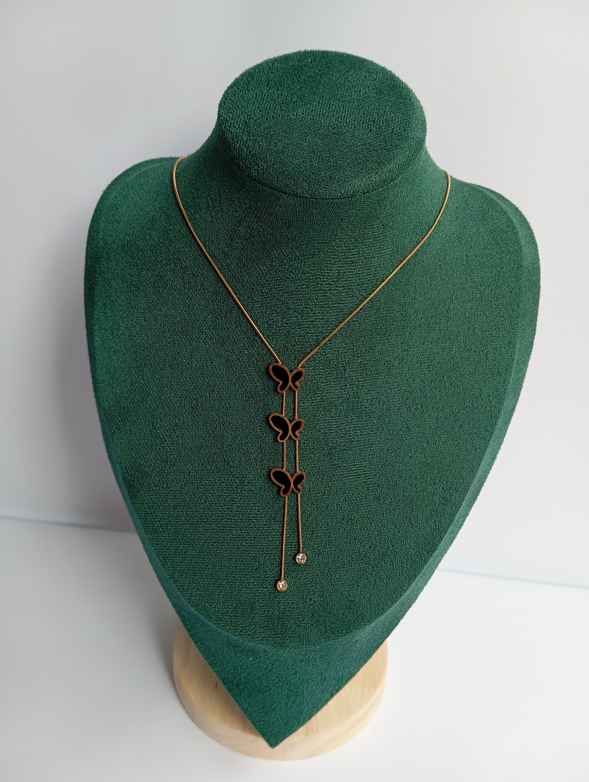 Gold Trio Butterfly Necklace featuring three elegant butterfly charms crafted from premium stainless steel. Waterproof, tarnish-free jewelry for women, ideal for everyday wear, parties, weddings, gifting, and fashionable styling.
