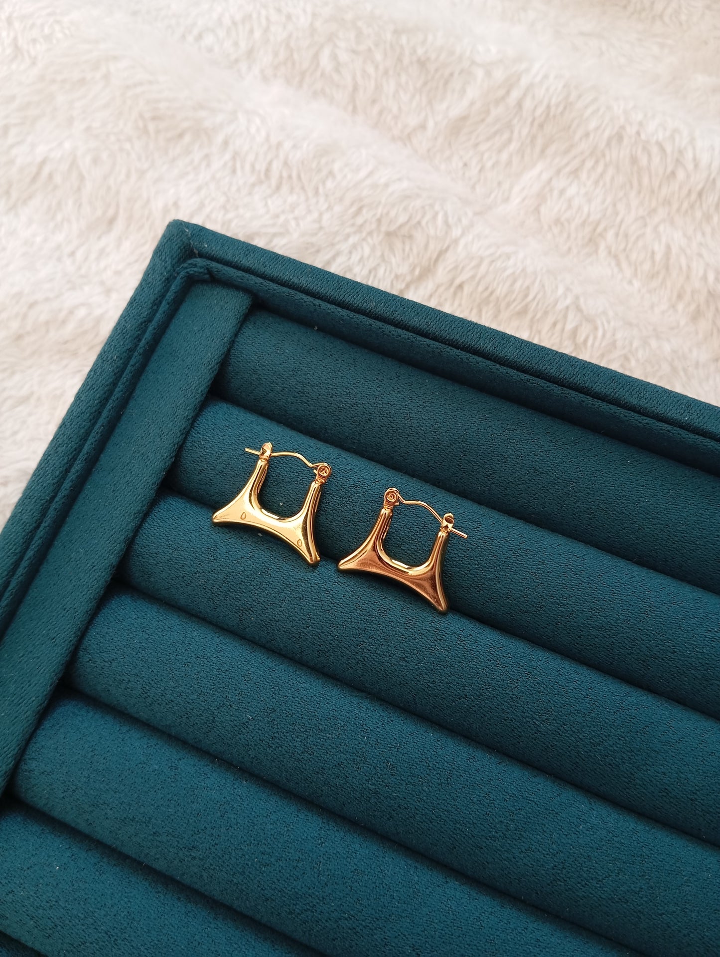 Golden Baglet Hoop Earrings crafted from premium stainless steel with a stylish hoop design and long-lasting gold finish. Waterproof, tarnish-free earrings for women, perfect for daily wear, office wear, parties, weddings, gifting, and special occasions.