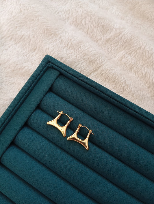 Golden Baglet Hoop Earrings crafted from premium stainless steel with a stylish hoop design and long-lasting gold finish. Waterproof, tarnish-free earrings for women, perfect for daily wear, office wear, parties, weddings, gifting, and special occasions.