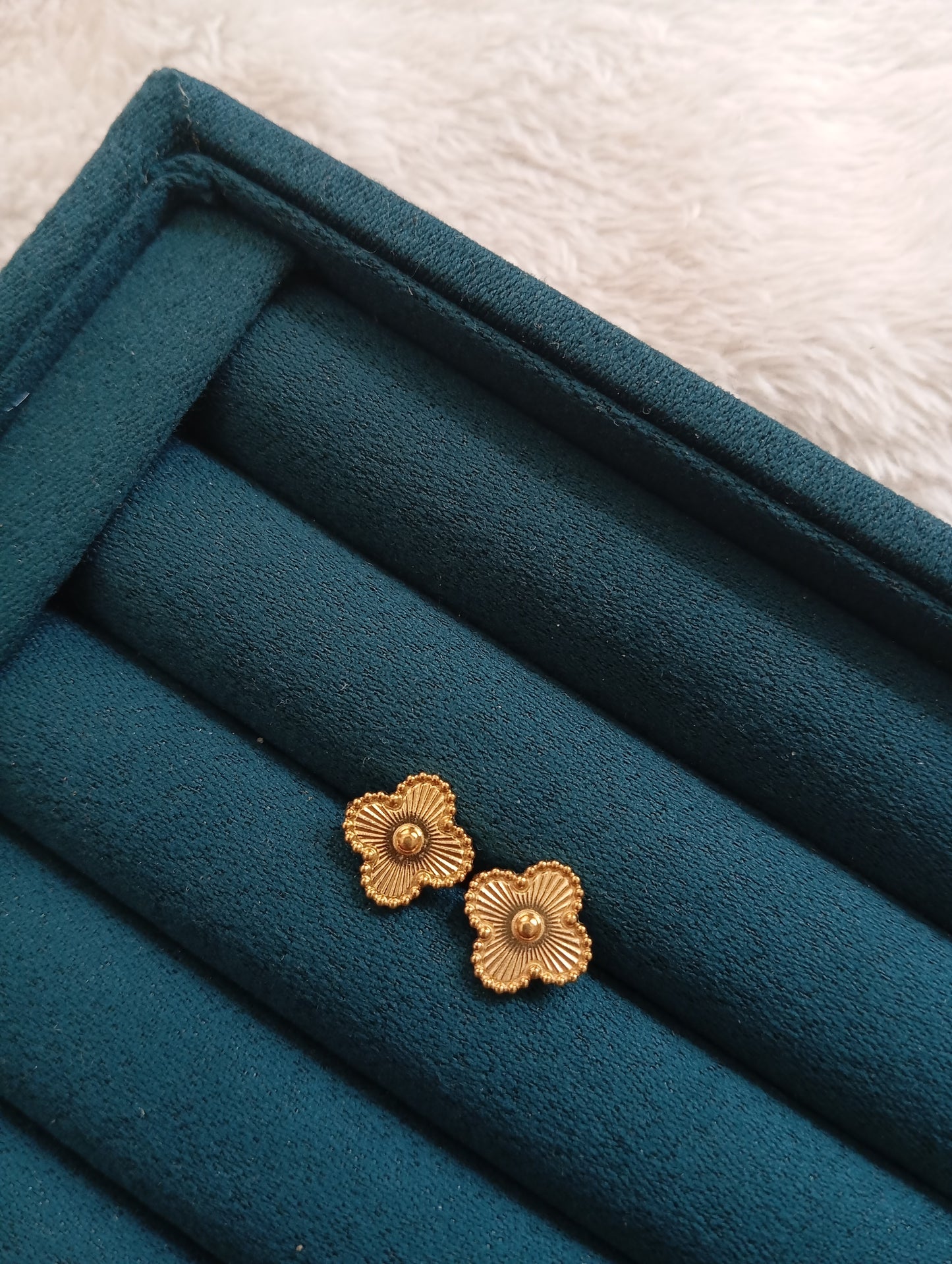 Golden Clover Stud Earrings crafted from premium stainless steel with an elegant clover design. Waterproof, tarnish-free stud earrings for women, perfect for daily wear, office wear, parties, gifting, and special occasions.