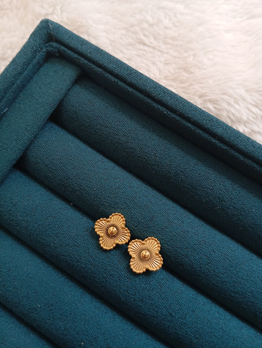 Golden Clover Stud Earrings crafted from premium stainless steel with an elegant clover design. Waterproof, tarnish-free stud earrings for women, perfect for daily wear, office wear, parties, gifting, and special occasions.