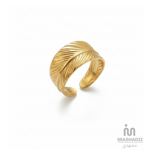 Golden Feather Ring crafted from premium stainless steel with an elegant feather-inspired design and long-lasting gold finish. Waterproof, tarnish-free, adjustable ring for women, perfect for daily wear, parties, weddings, gifting, and special occasions.

