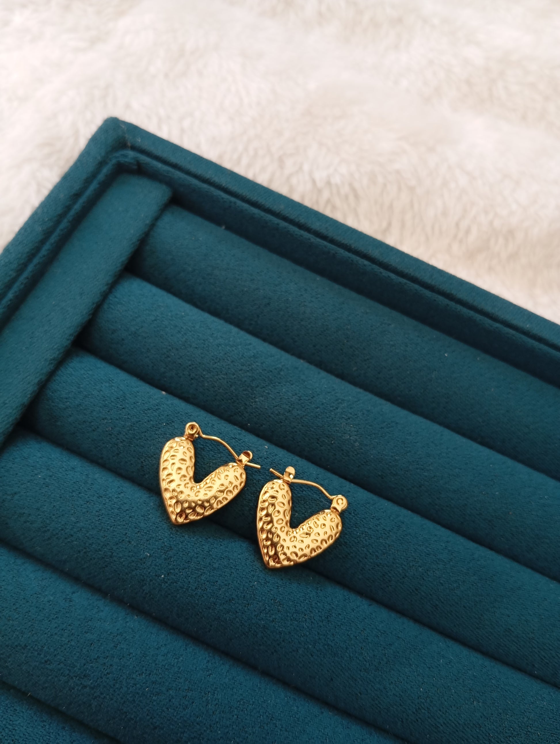 Golden Heart Hoop Earrings crafted from premium stainless steel with an elegant heart-shaped hoop design and long-lasting gold finish. Waterproof, tarnish-free earrings for women, perfect for daily wear, office wear, parties, weddings, gifting, and special occasions.