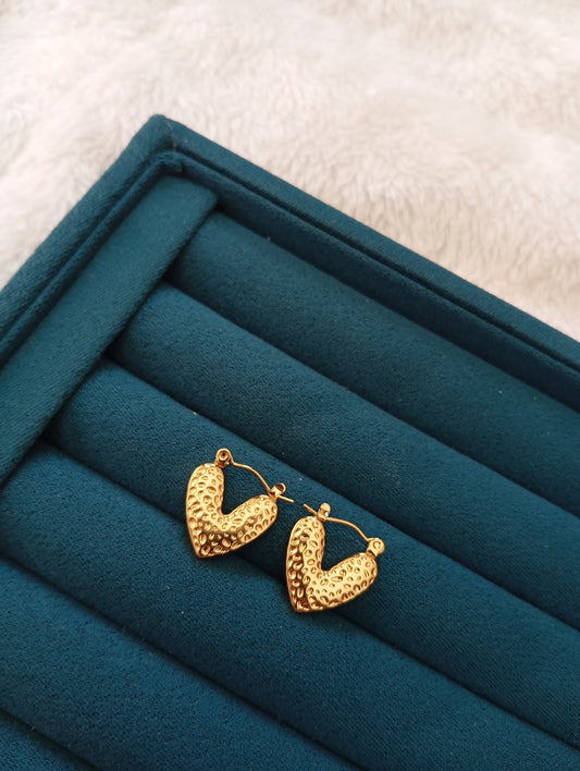 Golden Heart Hoop Earrings crafted from premium stainless steel with an elegant heart-shaped hoop design and long-lasting gold finish. Waterproof, tarnish-free earrings for women, perfect for daily wear, office wear, parties, weddings, gifting, and special occasions.