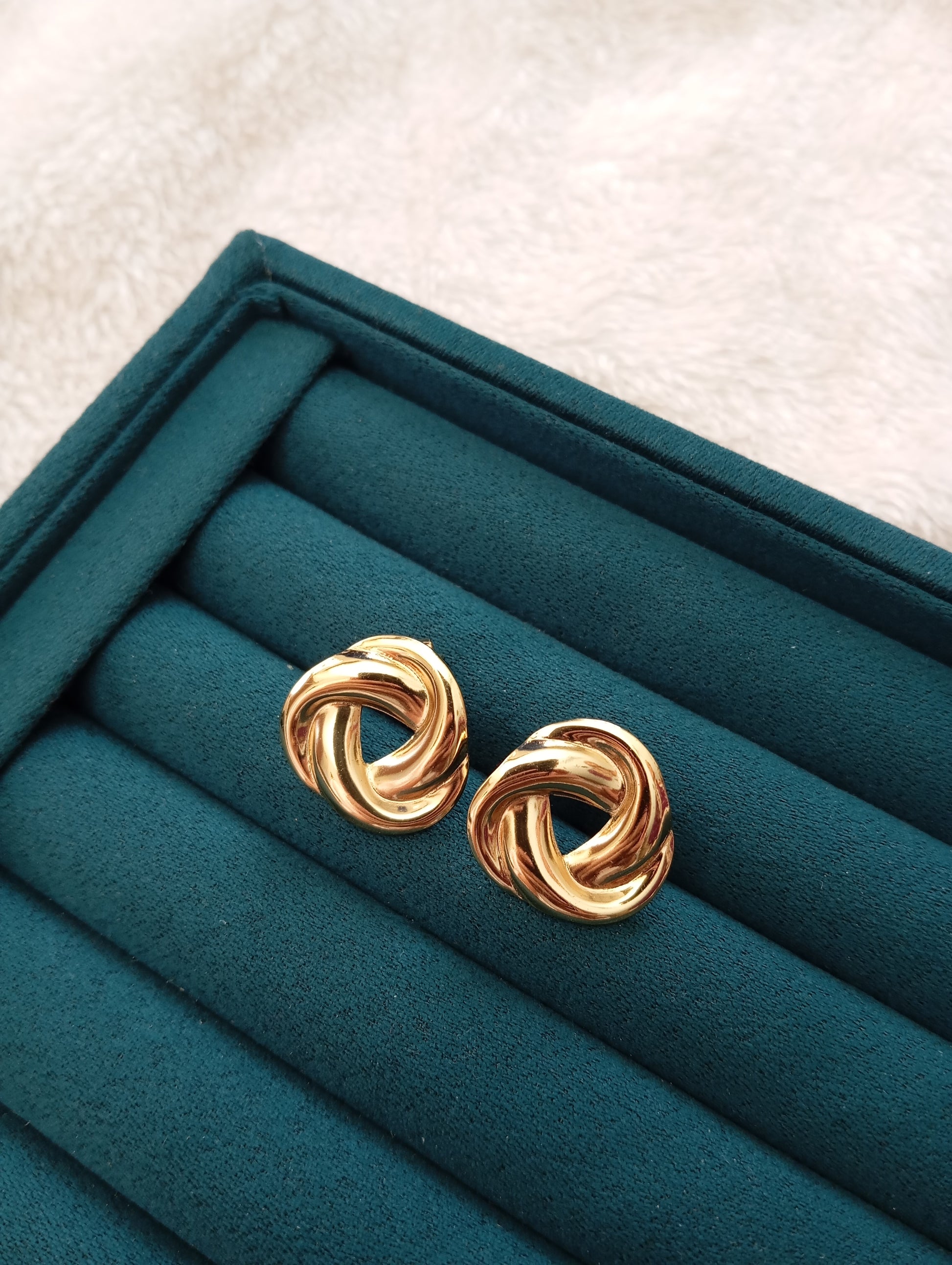 Golden Twisted Earrings crafted from premium stainless steel with an elegant twisted design and long-lasting gold finish. Waterproof, tarnish-free earrings for women, perfect for daily wear, office wear, parties, weddings, gifting, and special occasions.