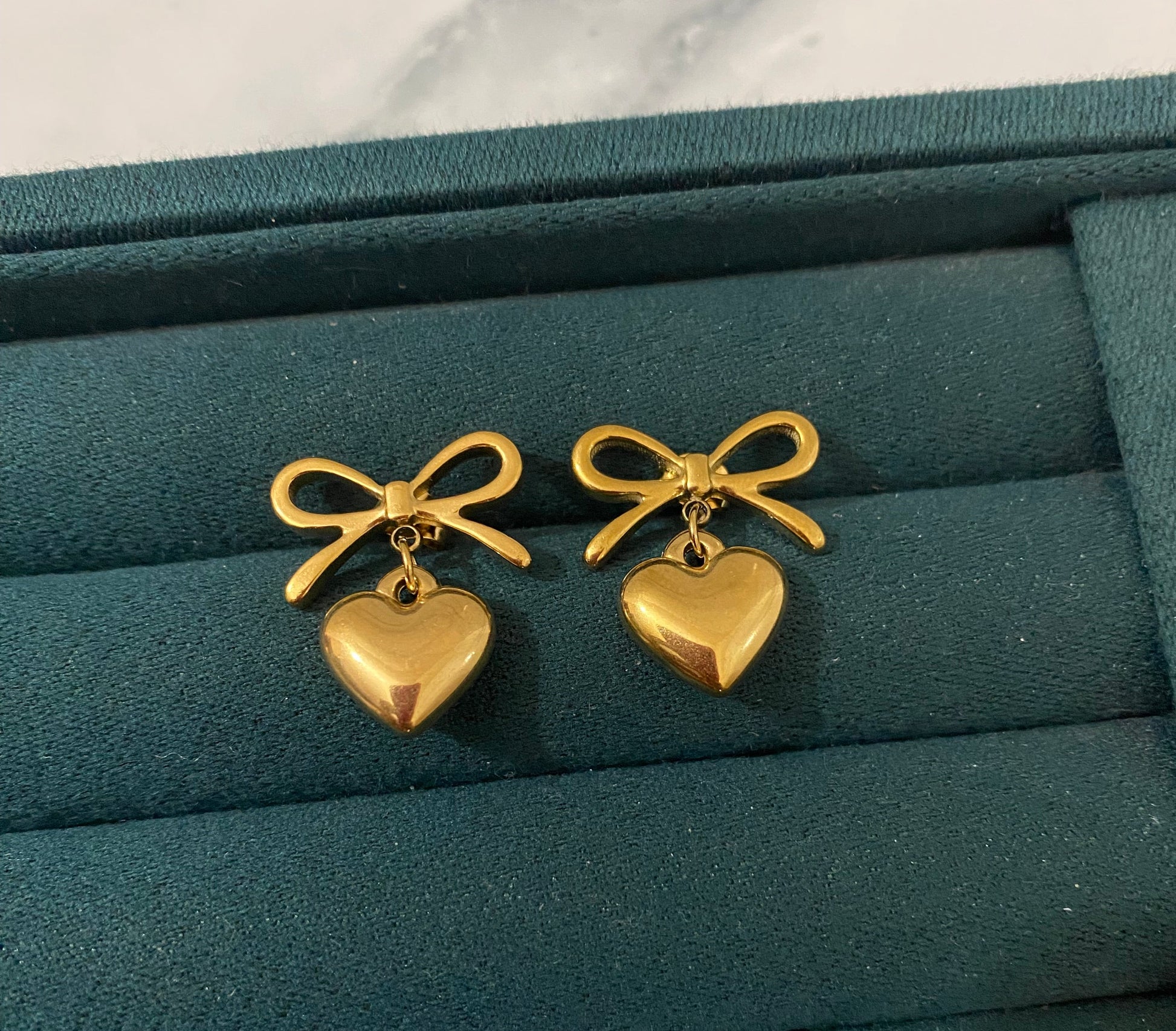 Heart Bow Earrings crafted from premium stainless steel featuring a heart and bow design. Waterproof, tarnish-free earrings for women, perfect for daily wear, parties, weddings, gifting, and special occasions.