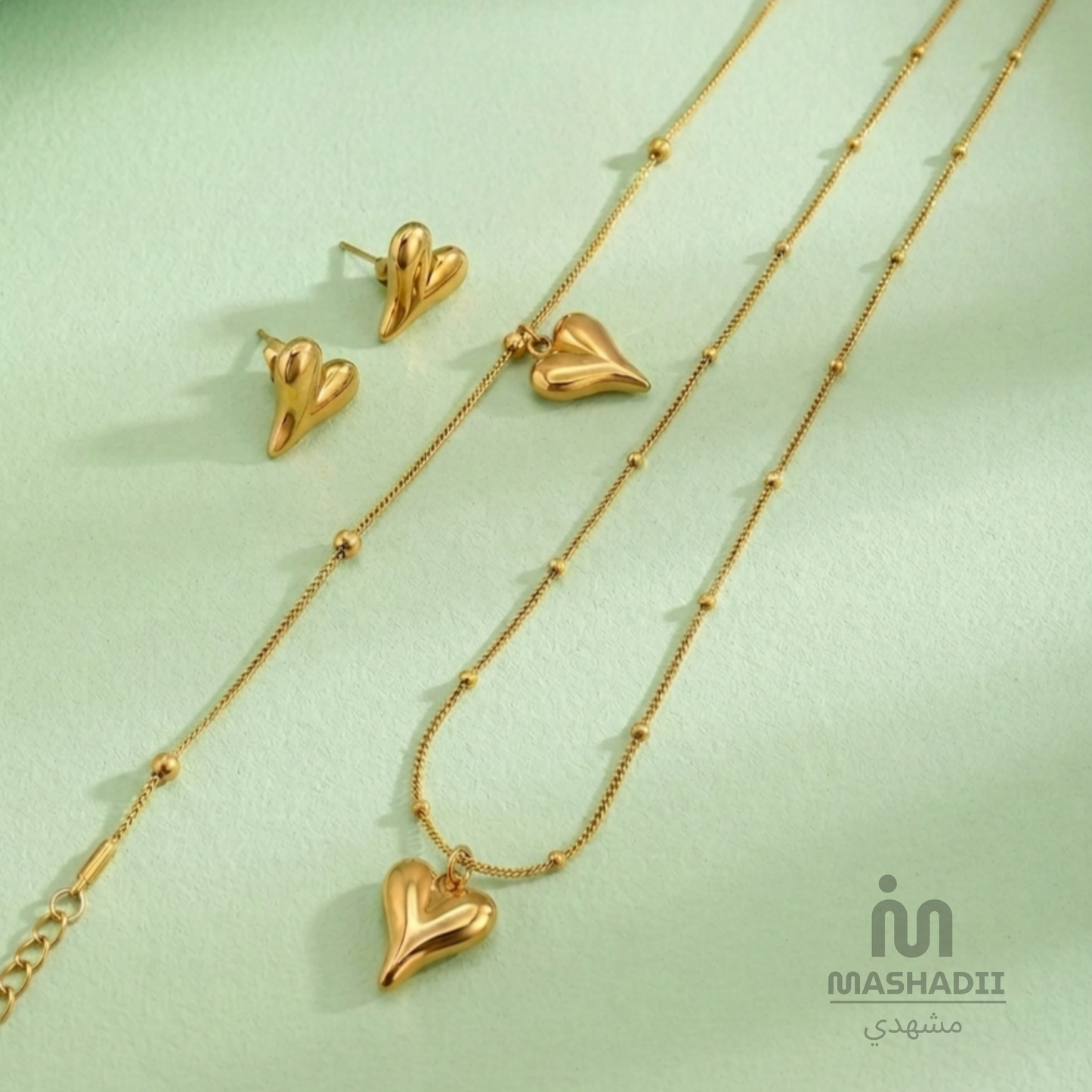Heart Jewelry Set featuring a matching stainless steel necklace, bracelet, and earrings with an elegant heart design. Waterproof, tarnish-free jewelry set for women, perfect for daily wear, parties, weddings, gifting, and special occasions.