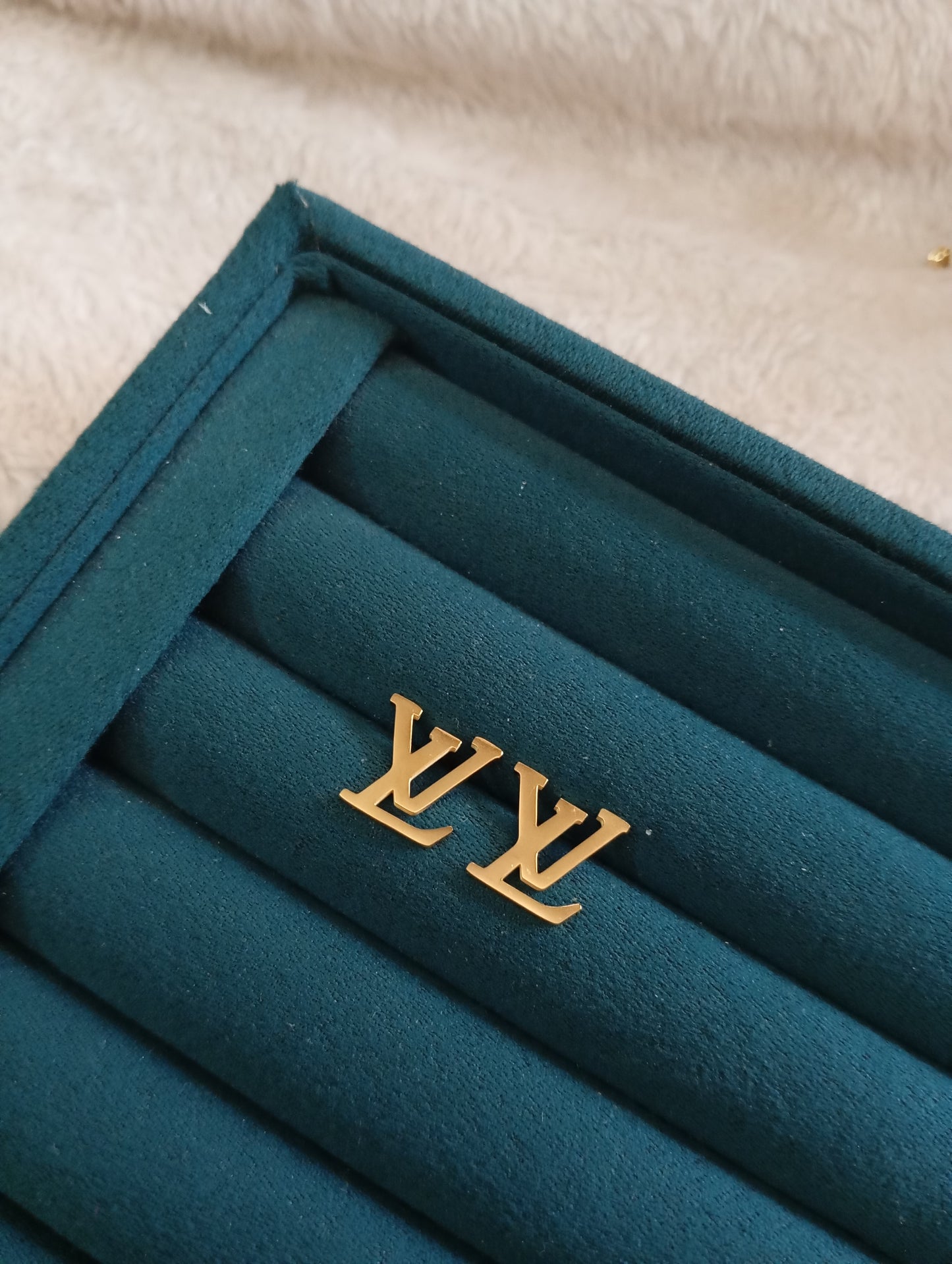 LV Basic Earrings crafted from premium stainless steel with a minimalist designer-inspired style. Waterproof, tarnish-free earrings for women, perfect for daily wear, office wear, parties, gifting, and special occasions.
