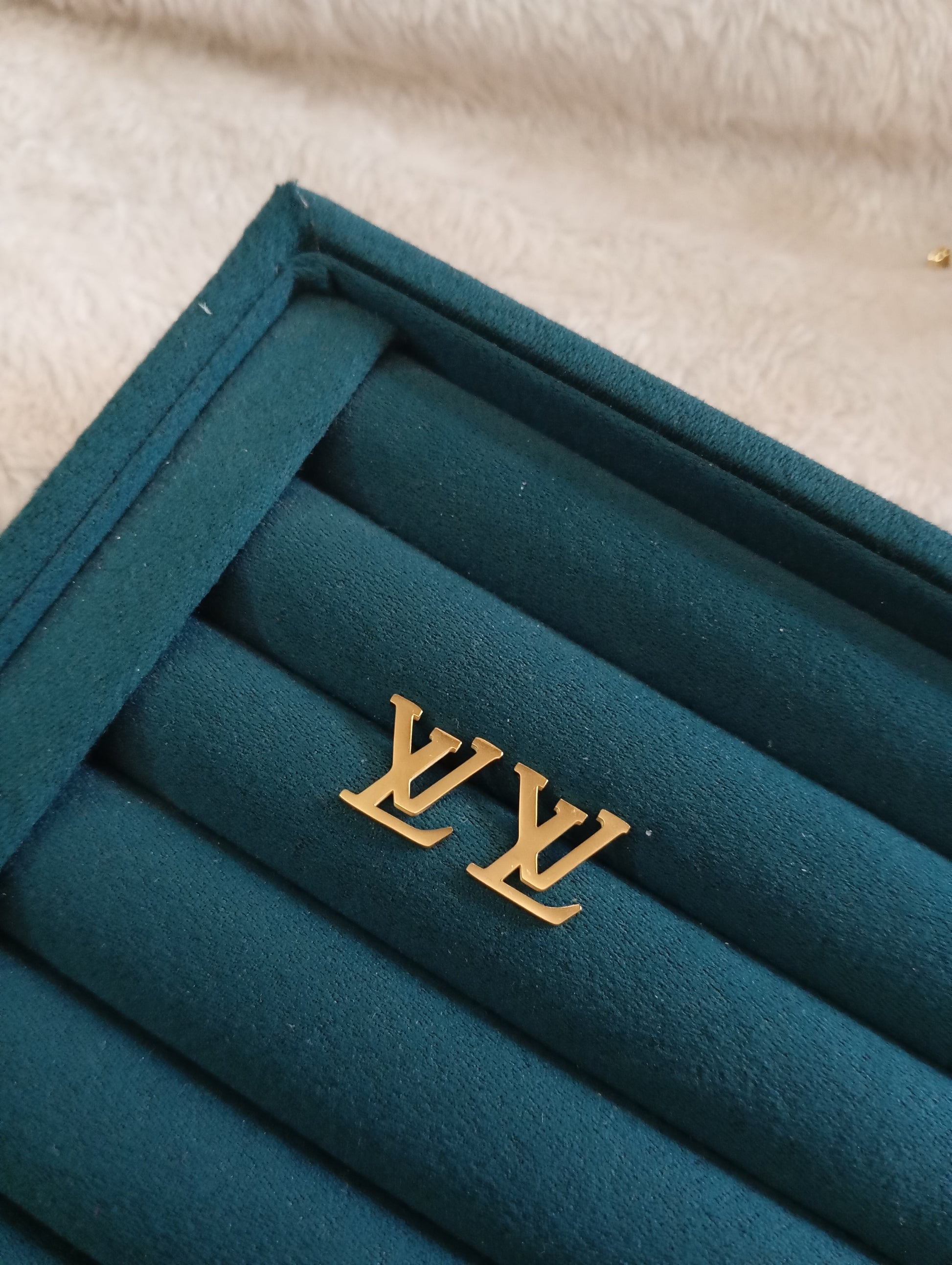 LV Basic Earrings crafted from premium stainless steel with a minimalist designer-inspired style. Waterproof, tarnish-free earrings for women, perfect for daily wear, office wear, parties, gifting, and special occasions.
