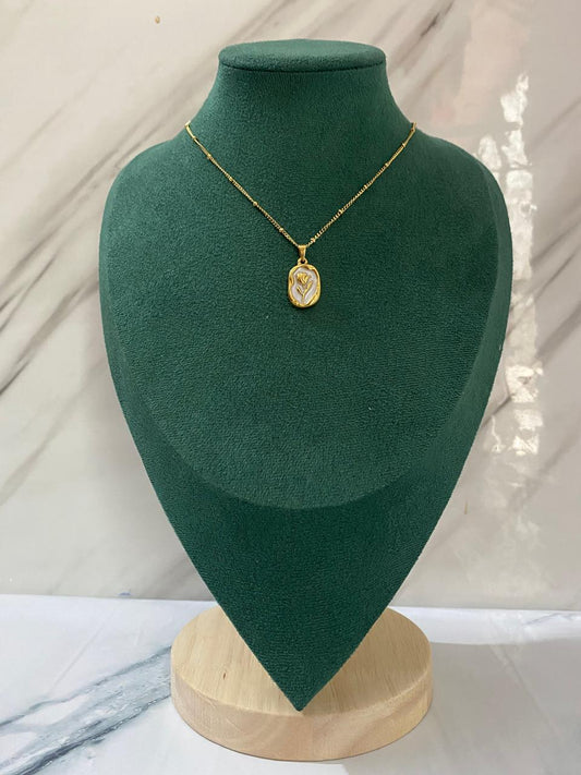 Gold Tulip White Stone Necklace crafted from premium stainless steel with sparkling white stone details and an elegant tulip-inspired design. Waterproof, tarnish-free necklace for women, perfect for daily wear, weddings, parties, gifting, and special occasions.
