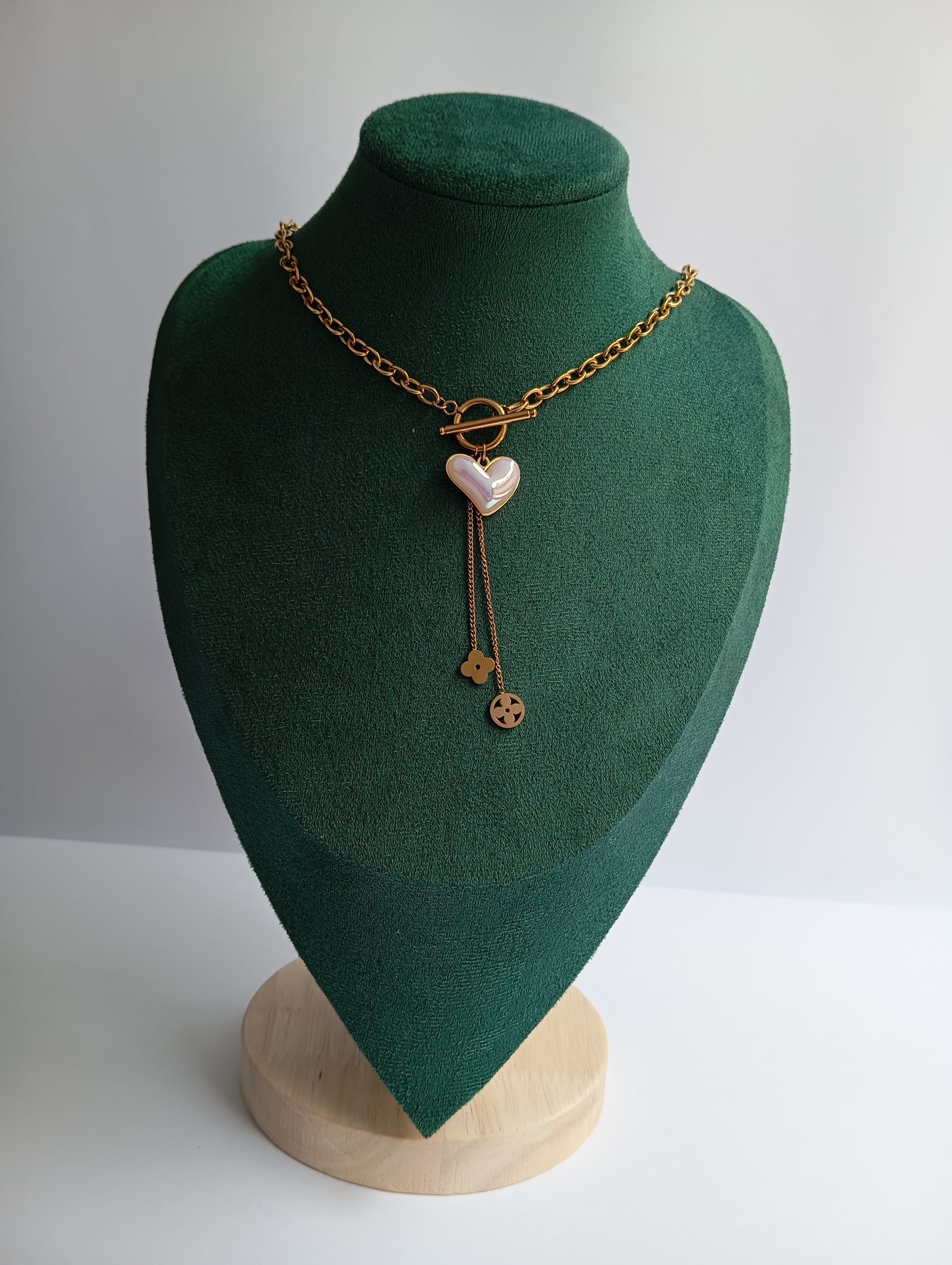 Gold White Heart Cross Broad Chain Necklace featuring a bold chain design with white heart and cross-inspired accents. Crafted from premium stainless steel, this waterproof and tarnish-free necklace is ideal for everyday wear, parties, weddings, gifting, and statement fashion styling.
