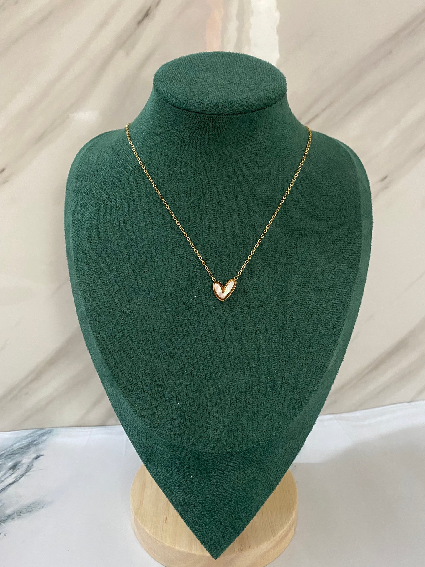 Gold White Stone Heart Necklace featuring a heart-shaped pendant embellished with sparkling white stones. Crafted from premium stainless steel, this waterproof and tarnish-free necklace is ideal for daily wear, romantic gifting, anniversaries, weddings, parties, and special occasions.
