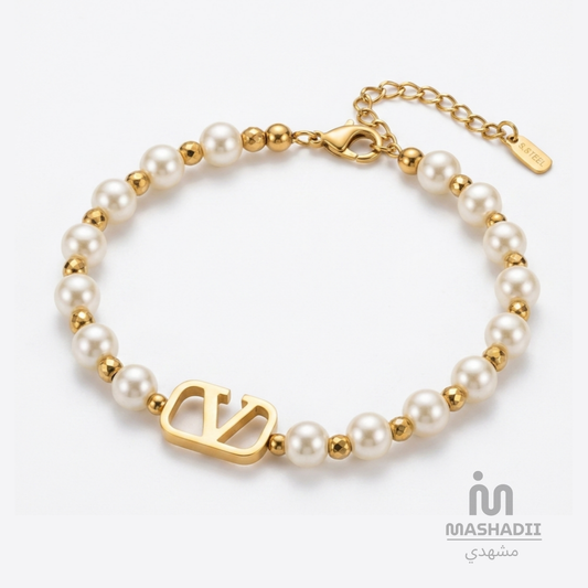 V Logo Signature Bracelet with Pearl – Waterproof, Tarnish-Free Stainless Steel Bracelet featuring a Signature V Logo, Elegant Pearl Detail, and a 1 Year Colour Guarantee